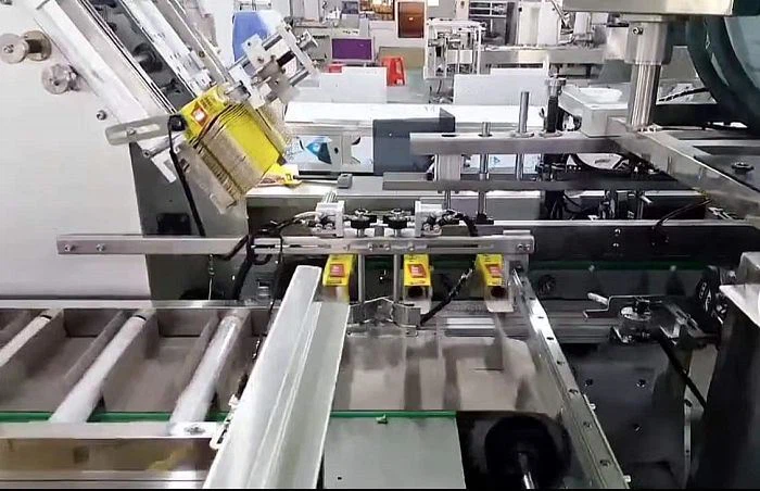 automatic preservative film box packing machine